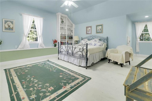 bedroom with ceiling fan and lofted ceiling