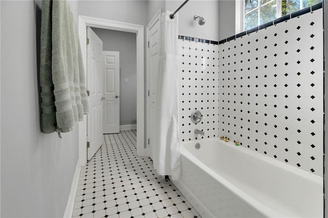 bathroom featuring tile patterned floors and shower / bath combo