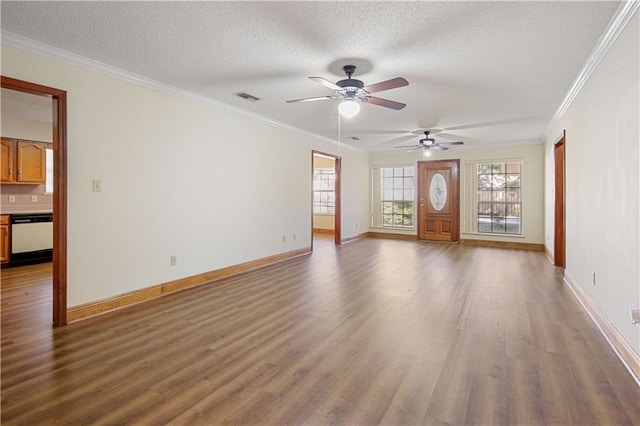 unfurnished living room featuring crown molding, ceiling fan, dark hardwood / wood-style floors, and a textured ceiling