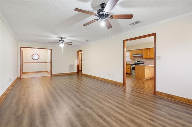 unfurnished living room with hardwood / wood-style floors, ornamental molding, and a textured ceiling