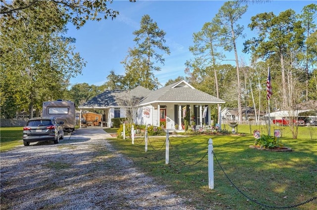 view of front of property featuring covered porch and a front lawn