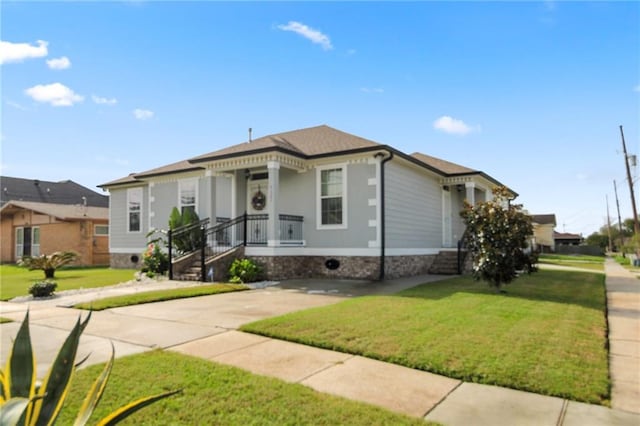 view of front of home with a front yard