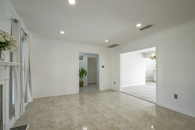 unfurnished room featuring crown molding and an inviting chandelier