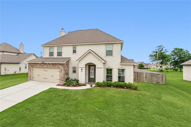 view of front of house with a garage and a front yard