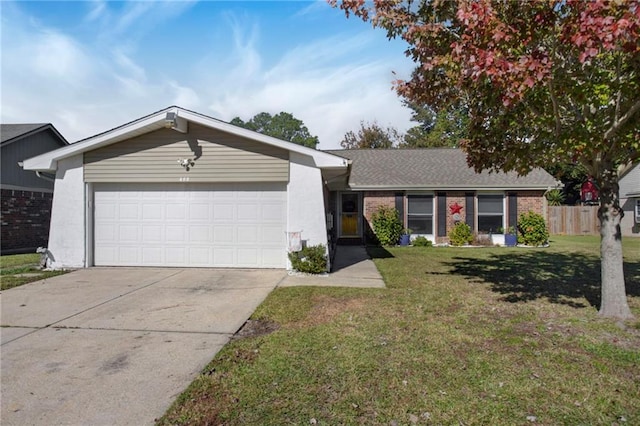 ranch-style home with a front lawn and a garage