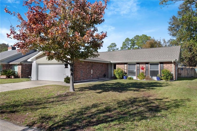 single story home featuring a garage and a front lawn