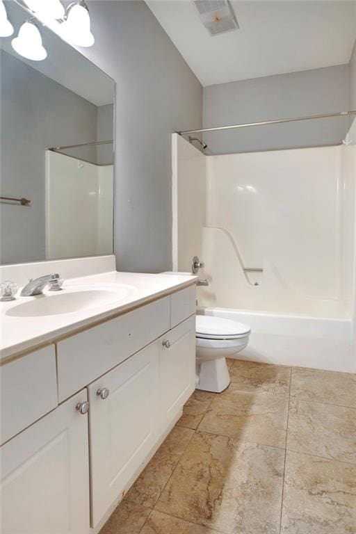 full bathroom with shower / bathing tub combination, vanity, and toilet