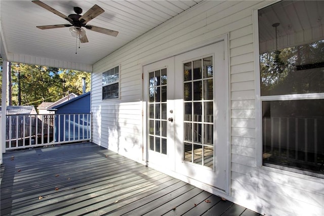 wooden terrace with french doors and ceiling fan