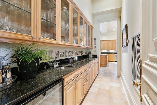 3832 Edenborn Ave, Metairie, LA 70002 - indoor wet bar featuring wine cooler, a heating unit, and tasteful backsplash