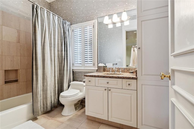 3832 Edenborn Ave, Metairie, LA 70002 - bathroom featuring toilet, tile patterned flooring, vanity, and shower / bath combination with curtain