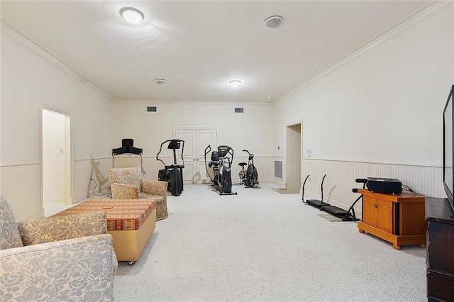 3832 Edenborn Ave, Metairie, LA 70002 - workout area featuring crown molding, a wainscoted wall, and carpet