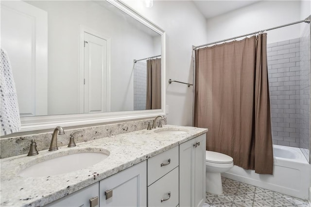 full bathroom featuring vanity, toilet, and shower / bathtub combination with curtain