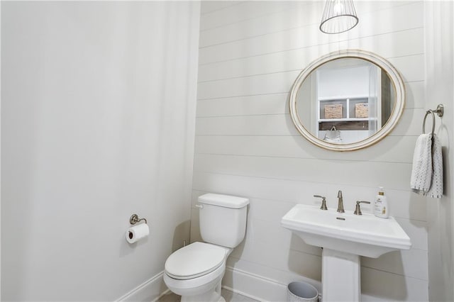 bathroom with toilet and sink