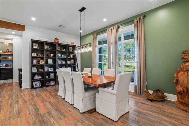 dining area featuring hardwood / wood-style floors