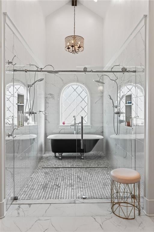 bathroom featuring separate shower and tub and high vaulted ceiling