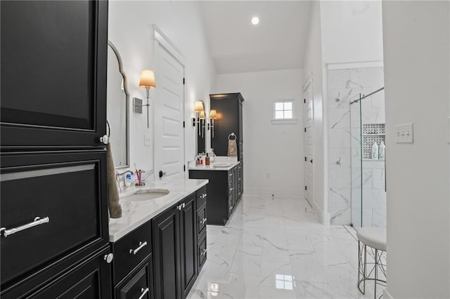 bathroom with vanity and walk in shower