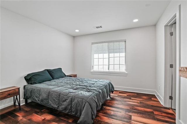 bedroom featuring dark wood-type flooring