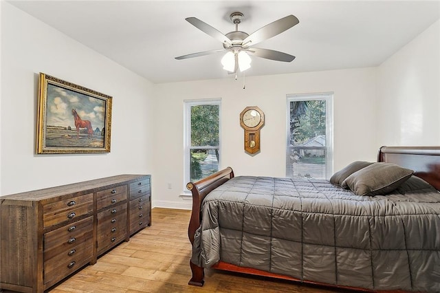 bedroom featuring ceiling fan and light wood-type flooring