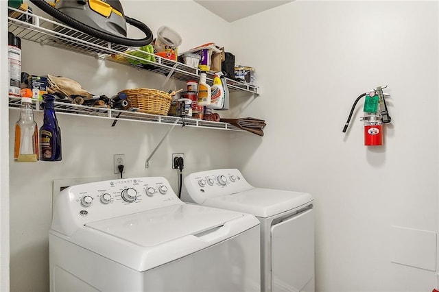 laundry room with washing machine and dryer