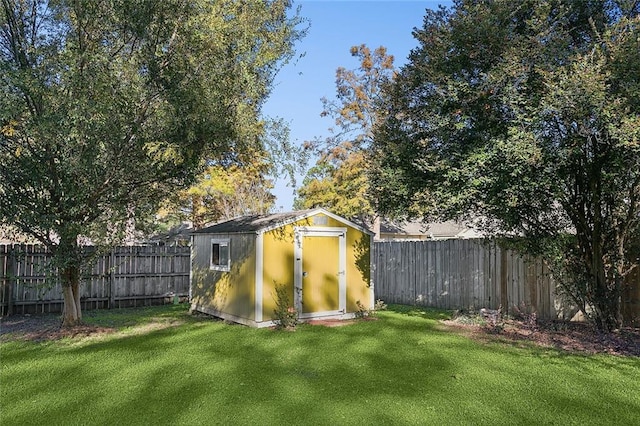 view of outbuilding featuring a lawn