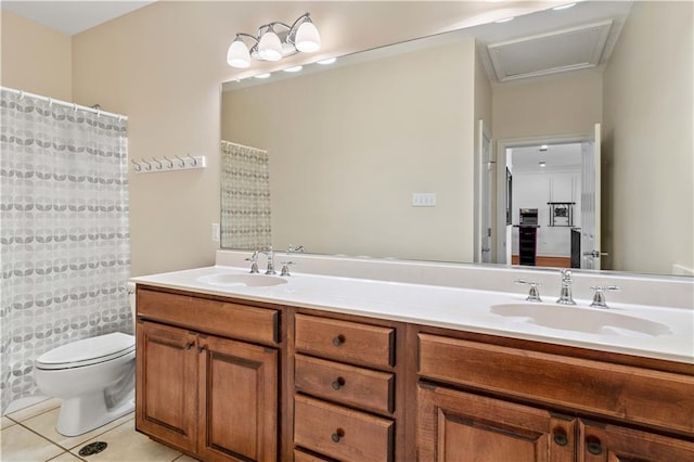 bathroom with tile patterned flooring, a shower with curtain, vanity, and toilet