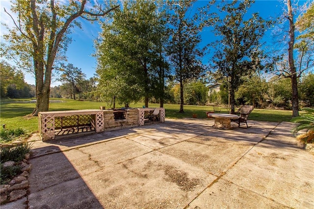 view of patio / terrace featuring a fire pit