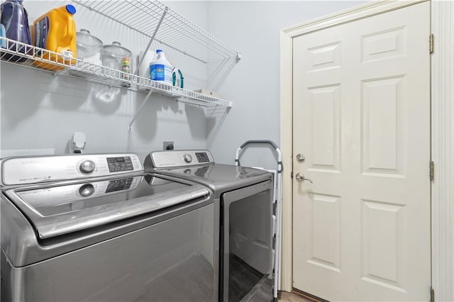 laundry area featuring independent washer and dryer