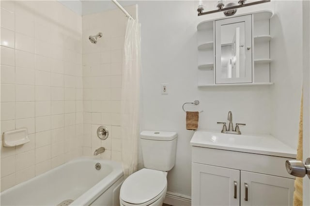 full bathroom featuring vanity, shower / bath combo, and toilet