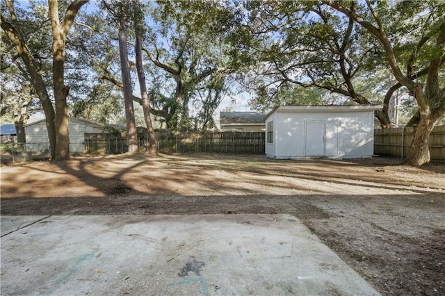 1492 W Hall Ave, Slidell, LA 70460 - fenced backyard featuring an outbuilding