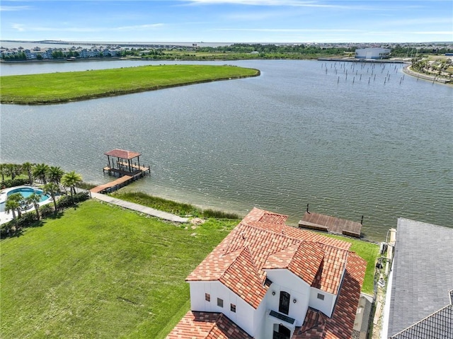 bird's eye view with a water view