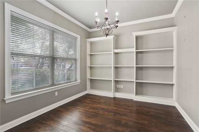 unfurnished dining area with ornamental molding, dark wood-type flooring, and an inviting chandelier