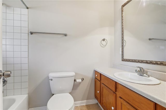 full bathroom with vanity, toilet, and tiled shower / bath combo