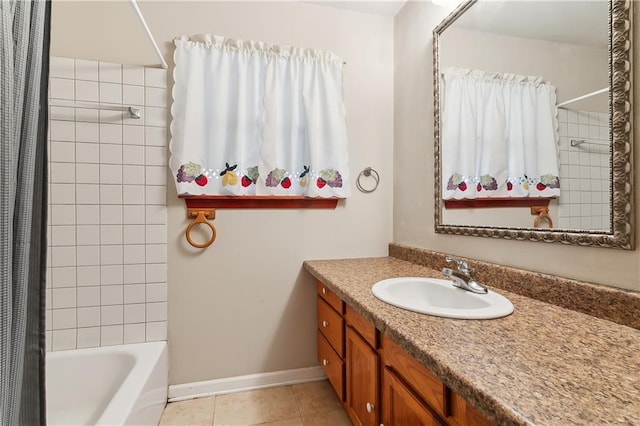 bathroom with tile patterned floors, vanity, and shower / tub combo