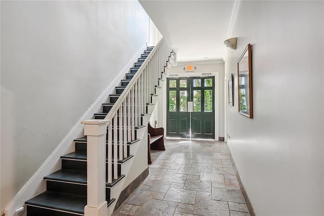 entryway with crown molding