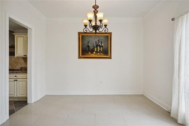 unfurnished dining area featuring light tile patterned floors, an inviting chandelier, and crown molding