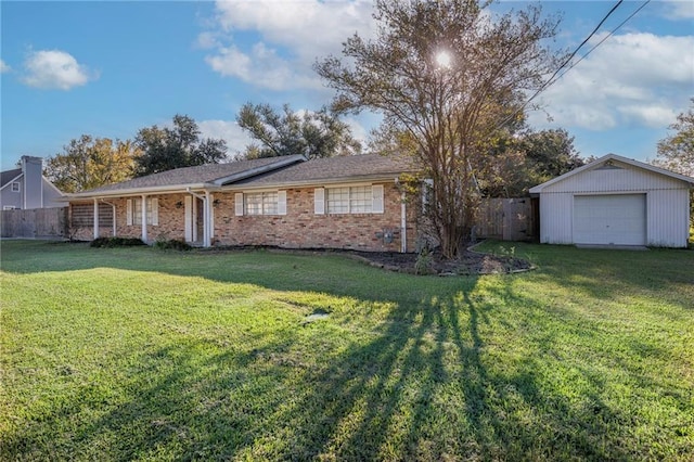 back of house with a lawn and a garage