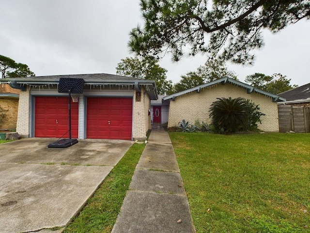 ranch-style home featuring a garage and a front yard