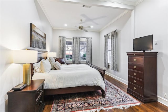 bedroom with ceiling fan, dark hardwood / wood-style flooring, and crown molding