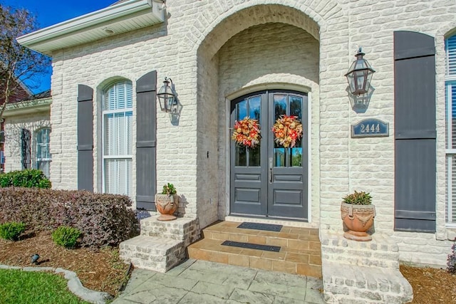 doorway to property featuring french doors