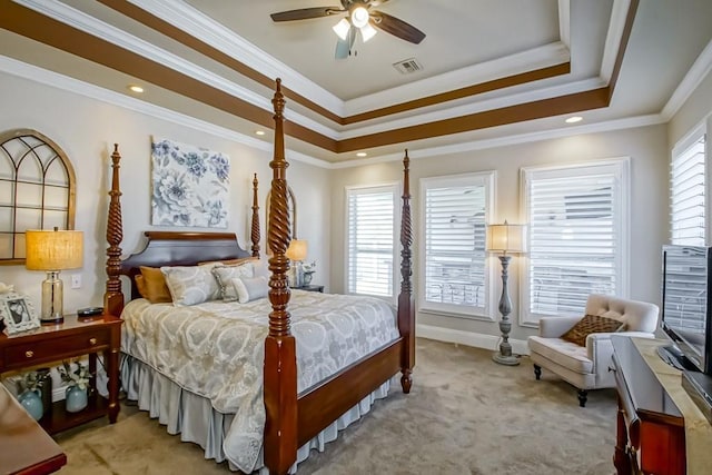 bedroom featuring multiple windows, ceiling fan, light colored carpet, and ornamental molding