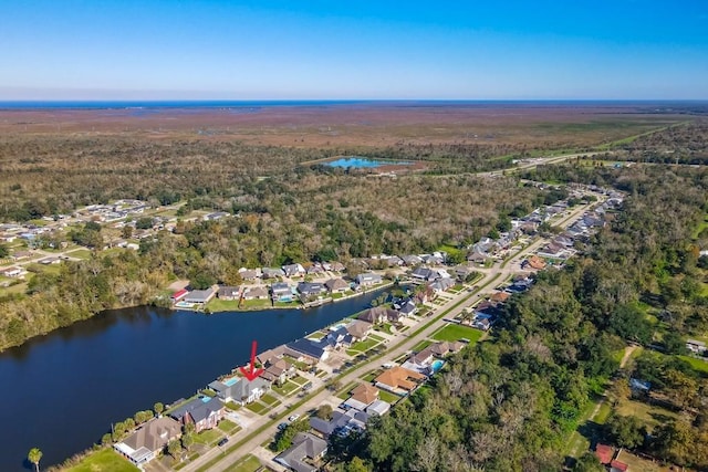 drone / aerial view with a water view