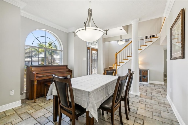 dining area featuring ornamental molding