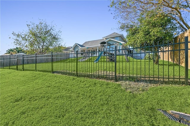 view of yard with a playground