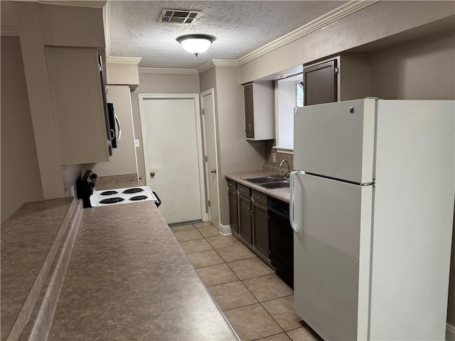 kitchen featuring white appliances, a textured ceiling, crown molding, sink, and light tile patterned floors