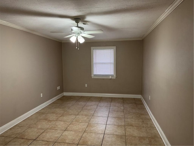 tiled spare room featuring a textured ceiling, ceiling fan, and ornamental molding