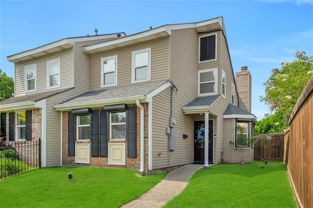 view of front of house with a front lawn