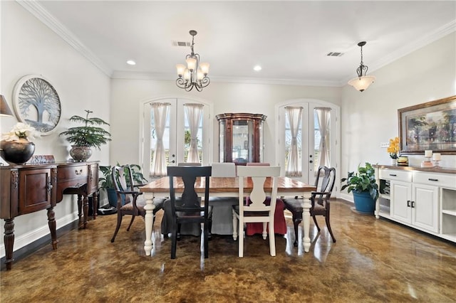 dining space featuring french doors, a chandelier, and ornamental molding