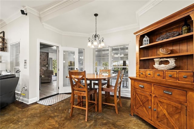 dining space featuring a notable chandelier and crown molding