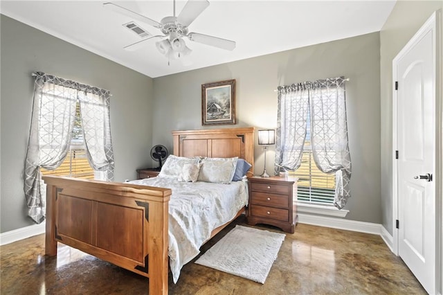 bedroom featuring multiple windows and ceiling fan