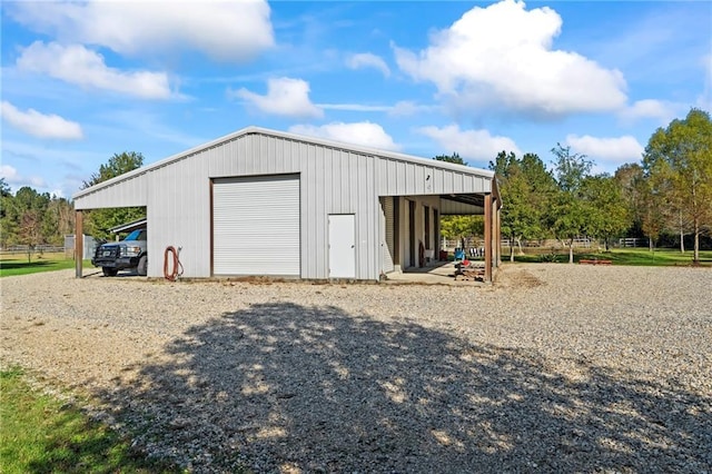 view of outdoor structure featuring a garage